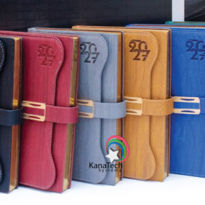 Home 8 A5 diaries 2027 available in blue, black, wooden, green and grey, ideal for branded corporate gifts, staff gifts and client giveaways in kenya.